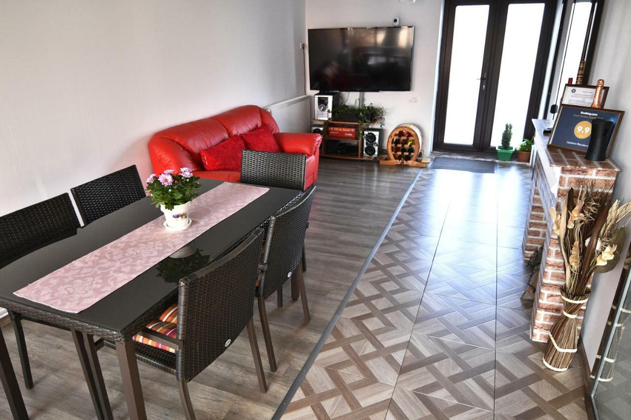Upstairs Residence ทาร์กู จิอู ภายนอก รูปภาพ